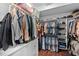 Spacious walk-in closet offers ample storage with custom shelving and hanging racks at 4769 Swordfish Dr, Raleigh, NC 27603