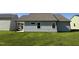 Home's backyard featuring new construction with a patio at 49 Heatherglenn Cir, Princeton, NC 27569