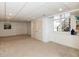 Unfinished basement space with a window is ready to be customized at 4912 Sunset Forest Cir, Holly Springs, NC 27540