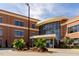 Beautiful brick building with large glass windows and professional landscaping at 4912 Sunset Forest Cir, Holly Springs, NC 27540