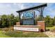 Entrance sign for Ting Park and the Town of Holly Springs, surrounded by landscaping at 4912 Sunset Forest Cir, Holly Springs, NC 27540