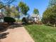 Charming two-story home with a well-manicured lawn and mature landscaping at 4912 Sunset Forest Cir, Holly Springs, NC 27540