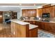Spacious kitchen with custom cabinetry, stainless appliances, and an open design at 4912 Sunset Forest Cir, Holly Springs, NC 27540