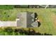 Bird's-eye view of a house boasting a well-maintained roof and a long, patterned driveway at 518 Ranch Farm Rd, Raleigh, NC 27603
