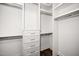 Walk-in closet with built-in shelving and drawers for organized storage at 518 Ranch Farm Rd, Raleigh, NC 27603