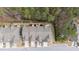 Aerial view of townhomes highlighting property lines and convenient parking areas at 521 Rockcastle Dr, Cary, NC 27519