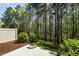Private back patio featuring view of mature trees, perfect for outdoor enjoyment and entertaining at 521 Rockcastle Dr, Cary, NC 27519