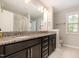 Bathroom with double vanity and tile flooring, and a shower-tub combination at 521 Rockcastle Dr, Cary, NC 27519