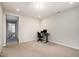 Bedroom/office with carpet floors and light colored walls, featuring a work desk at 521 Rockcastle Dr, Cary, NC 27519