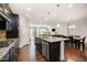 Spacious kitchen with stainless steel appliances, granite countertops, and kitchen island at 521 Rockcastle Dr, Cary, NC 27519