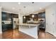 Modern kitchen featuring stainless steel appliances and granite countertops with a center island at 521 Rockcastle Dr, Cary, NC 27519