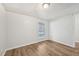 Finished basement room features new vinyl floors and a window at 5218 Revere Rd, Durham, NC 27713