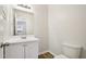 The recently updated bathroom features a modern vanity with a framed mirror at 5218 Revere Rd, Durham, NC 27713