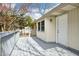 The spacious deck includes an exterior door and windows, offering additional access to the backyard at 5218 Revere Rd, Durham, NC 27713