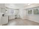 A practical kitchen featuring all-white cabinets, providing a crisp and modern look at 5218 Revere Rd, Durham, NC 27713