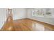 Hardwood floors and lots of windows, making this space versatile and bright at 5218 Revere Rd, Durham, NC 27713