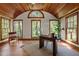 Bright office space with wood accents, natural light, and views of the surrounding woods at 5401 Friends School Rd, Durham, NC 27705