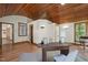 Bright office space with wood accents, natural light, and views of the surrounding woods at 5401 Friends School Rd, Durham, NC 27705
