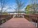Spacious wooden deck perfect for outdoor relaxation and entertaining, with tree views at 5505 Crabtree Park Ct, Raleigh, NC 27612
