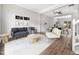 Well-lit living room boasts hardwood floors, modern furniture, and an open floor plan at 5505 Crabtree Park Ct, Raleigh, NC 27612