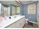 Bright bathroom with a wide mirror, neutral color palette, and plenty of space at 600 Old Farm Rd Rd, Graham, NC 27253