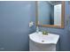 Bathroom with blue walls and a modern sink and faucet at 600 Old Farm Rd Rd, Graham, NC 27253