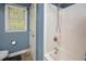 Bright bathroom with a shower/bathtub combo and neutral paint at 600 Old Farm Rd Rd, Graham, NC 27253