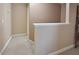 Hallway with tan walls and white trim at 600 Old Farm Rd Rd, Graham, NC 27253