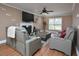 Comfortable living room featuring a fire place and leather couches at 600 Old Farm Rd Rd, Graham, NC 27253