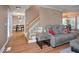 Open living room with hardwood floors and staircase leading upstairs at 600 Old Farm Rd Rd, Graham, NC 27253