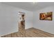 Clean dining room with hardwood floors, neutral paint, with easy access to the kitchen at 613 Holly Thorn, Holly Springs, NC 27540