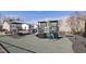 Community playground with covered picnic area and various play structures at 613 Holly Thorn, Holly Springs, NC 27540