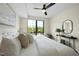 Bright bedroom featuring a ceiling fan, lots of natural light, and modern furnishings at 615 W Peace St # 201, Raleigh, NC 27605