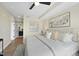 This bedroom has neutral decor, wood flooring, an ensuite, and a walk in closet at 615 W Peace St # 201, Raleigh, NC 27605