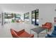Bright lobby with large windows offers a comfortable seating area with views of the street at 615 W Peace St # 201, Raleigh, NC 27605
