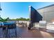 Roof deck with tables, chairs, and outdoor seating at 615 W Peace St # 201, Raleigh, NC 27605