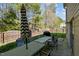 Backyard features a grill and outdoor dining set on a wooden deck, perfect for entertaining at 616 Branchview Dr, Durham, NC 27713