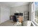 Bedroom featuring a desk with dual monitors and a large window at 616 Branchview Dr, Durham, NC 27713
