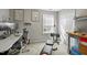 Bright bedroom featuring a desk and exercise equipment at 616 Branchview Dr, Durham, NC 27713