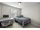 A bedroom featuring a desk and a bed at 616 Branchview Dr, Durham, NC 27713