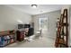 Bedroom featuring a desk with dual monitors and a large window at 616 Branchview Dr, Durham, NC 27713