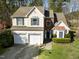 Beautiful two-story home with a two-car garage, green shutters, and a meticulously kept lawn at 616 Branchview Dr, Durham, NC 27713