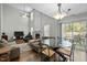 Large living room with high ceilings, fireplace, sliding doors and plenty of seating at 616 Branchview Dr, Durham, NC 27713