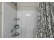 Modern shower with chrome fixtures and a shower curtain at 616 Branchview Dr, Durham, NC 27713