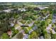 An aerial view of a charming home in a lush, mature neighborhood, offering a serene and private setting at 6216 Valley Estates Dr, Raleigh, NC 27612