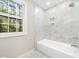 Bathroom featuring a tub and modern fixtures at 6216 Valley Estates Dr, Raleigh, NC 27612