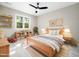Bedroom with a wooden bed, shelves, and a window at 6216 Valley Estates Dr, Raleigh, NC 27612