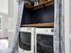 The laundry closet has lots of room for folding clothes and storing supplies at 7221 Messenger Dr, Willow Springs, NC 27592