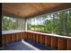Enjoy the view with the wooded scenery and natural light from the outdoor balcony at 7436 Summer Tanager Trl, Raleigh, NC 27614