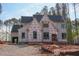 Exterior view of home in construction phase showcasing its architectural design at 7436 Summer Tanager Trl, Raleigh, NC 27614